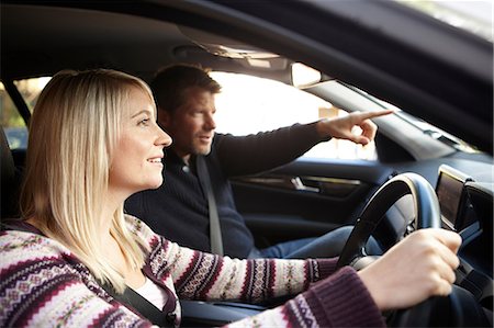 pilot - Couple à l'intérieur de la voiture Photographie de stock - Premium Libres de Droits, Code: 614-06443015