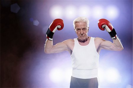spotlight portrait - Boxer masculin senior, dur à la recherche Photographie de stock - Premium Libres de Droits, Code: 614-06443055