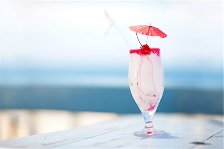 summer still life - Close up of tropical drink on table Stock Photo - Premium Royalty-Free, Code: 614-06537085