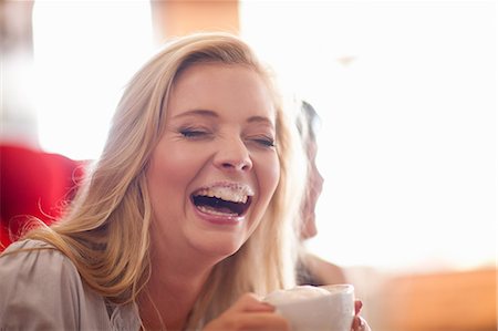 foam - Laughing woman with milk mustache Stock Photo - Premium Royalty-Free, Code: 614-06537179
