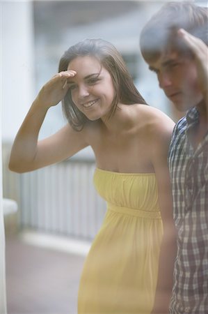 people looking store window - Couple window shopping together Stock Photo - Premium Royalty-Free, Code: 614-06537343