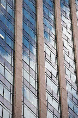 Close up of urban skyscraper Stock Photo - Premium Royalty-Free, Code: 614-06537430