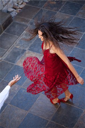 romance dance - Woman in gown spinning outdoors Stock Photo - Premium Royalty-Free, Code: 614-06624034