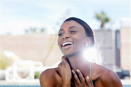 Close up of smiling woman's face Photographie de stock - Premium Libres de Droits, Code: 614-06624307