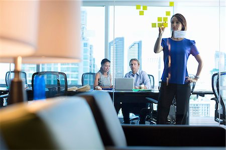 skyscrapers glass - Business people working in office Stock Photo - Premium Royalty-Free, Code: 614-06624394