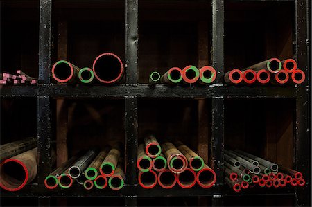 Shelves of colorful metal pipes in plant Stock Photo - Premium Royalty-Free, Code: 614-06624509
