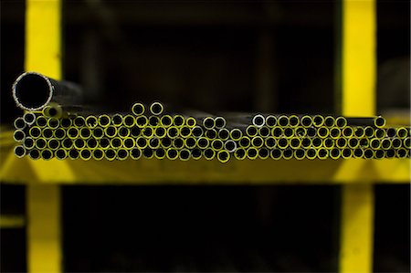 frames on shelf - Shelves of colorful metal pipes in plant Stock Photo - Premium Royalty-Free, Code: 614-06624510