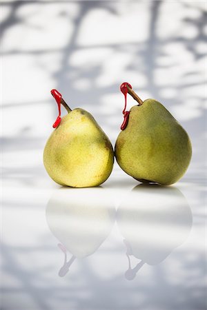 simsearch:614-06624594,k - Pears with red tags on stems Stock Photo - Premium Royalty-Free, Code: 614-06624593