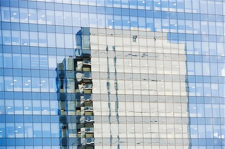framed (photographic border showing) - Skyscraper reflected in windows Stock Photo - Premium Royalty-Free, Code: 614-06624676