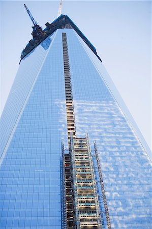 exterior window glass pattern - Scaffolding on urban skyscraper Stock Photo - Premium Royalty-Free, Code: 614-06624685