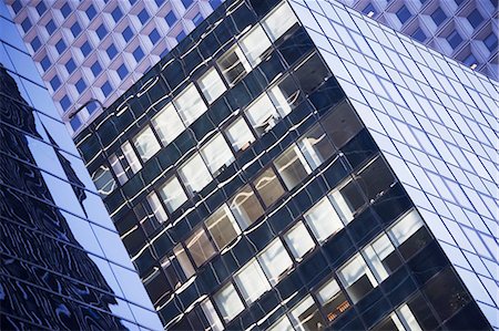 rascacielos - Reflective windows of urban skyscrapers Foto de stock - Sin royalties Premium, Código: 614-06624686