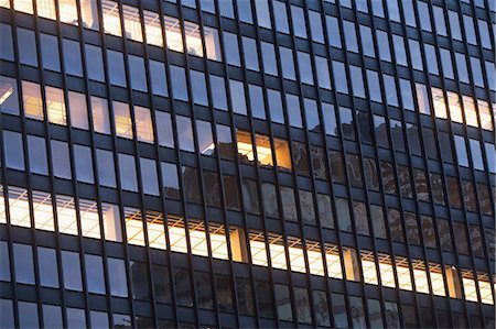 simsearch:614-06624686,k - Illuminated windows of skyscraper Foto de stock - Sin royalties Premium, Código: 614-06624683