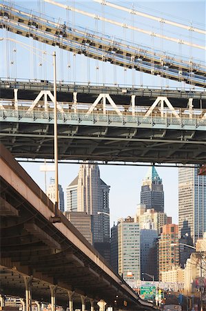 streets photo downtown - New York City skyline and bridge Stock Photo - Premium Royalty-Free, Code: 614-06624711