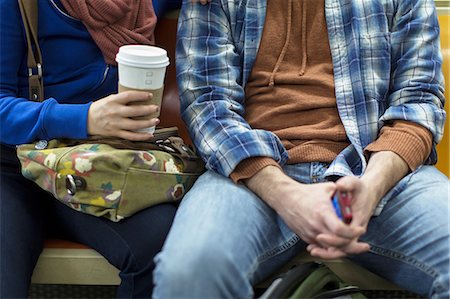 simsearch:614-06625005,k - Couple sitting on urban subway Photographie de stock - Premium Libres de Droits, Code: 614-06624987