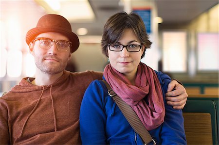 eyeglasses - Couple siting on bench together Stock Photo - Premium Royalty-Free, Code: 614-06625006