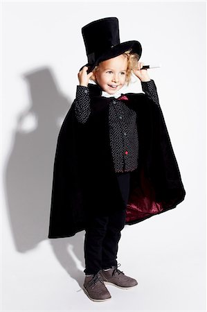 Boy wearing magician costume Stock Photo - Premium Royalty-Free, Code: 614-06625266