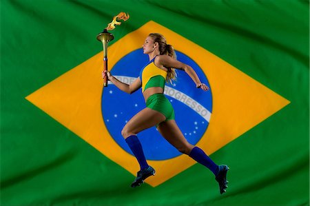 proud flag - Brazilian runner carrying Olympic torch Photographie de stock - Premium Libres de Droits, Code: 614-06625327