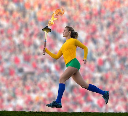 Brazilian runner carrying Olympic torch Foto de stock - Sin royalties Premium, Código: 614-06625335