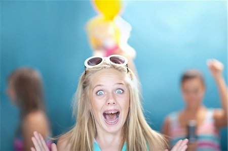 stunned - Teenage girl gasping Stock Photo - Premium Royalty-Free, Code: 614-06623487