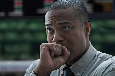 Tense businessman at stock exchange Photographie de stock - Premium Libres de Droits, Code: 614-06718185