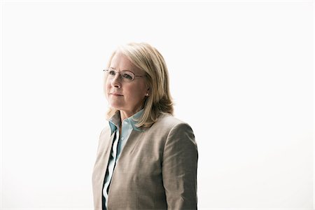 Portrait of mature businesswoman wearing glasses Stock Photo - Premium Royalty-Free, Code: 614-06718215