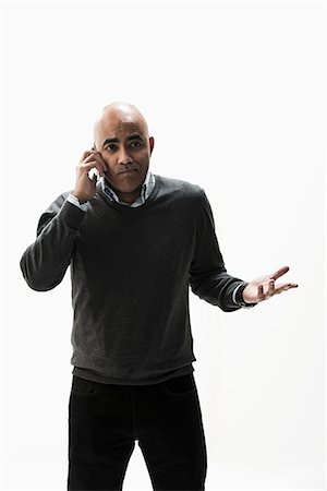displeased - Businessman on the phone Stock Photo - Premium Royalty-Free, Code: 614-06718220