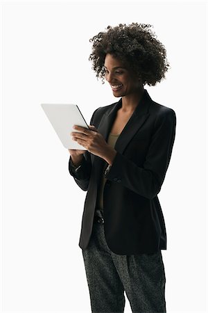 Businesswoman holding digital tablet Stock Photo - Premium Royalty-Free, Code: 614-06718239