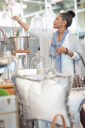 plastic flowers - Woman shopping in store Stock Photo - Premium Royalty-Free, Code: 614-06718340