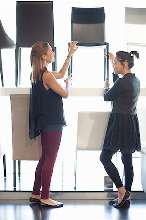 shopping for furniture - Women shopping for chairs in store Stock Photo - Premium Royalty-Free, Code: 614-06718404