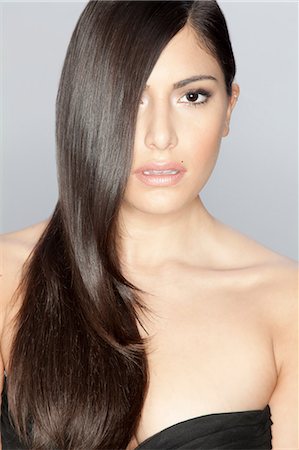Woman with long straight hair Foto de stock - Sin royalties Premium, Código: 614-06718754