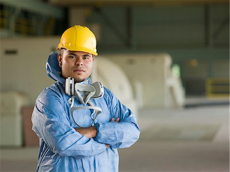 Engineer wearing protective suit on site Stock Photo - Premium Royalty-Free, Code: 614-06718859