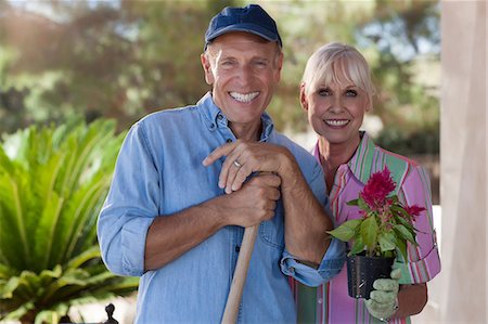 senior gardening looking at camera - Older couple gardening together Stock Photo - Premium Royalty-Free, Code: 614-06718983