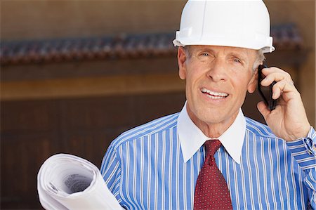 simsearch:6108-05860479,k - Businessman in hard hat with blueprints Stockbilder - Premium RF Lizenzfrei, Bildnummer: 614-06719037