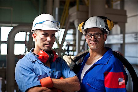 portrait 40 year old man serious straight on - Industrial workers in plant Stock Photo - Premium Royalty-Free, Code: 614-06719085