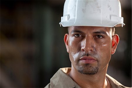 people with hard hats - Industrial worker in plant Stock Photo - Premium Royalty-Free, Code: 614-06719115