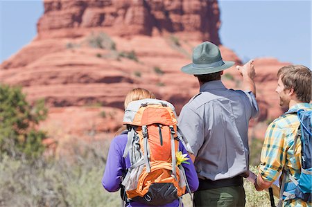 Hikers talking to park ranger Stock Photo - Premium Royalty-Free, Code: 614-06719146