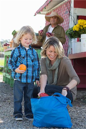 family in the market - Mother and son at farmer?s market Stock Photo - Premium Royalty-Free, Code: 614-06719228