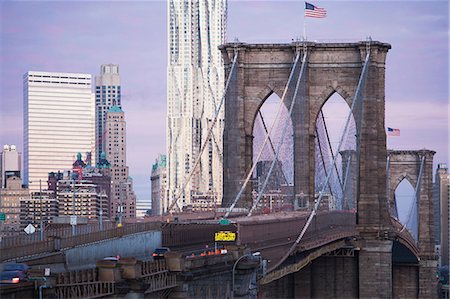 pictures of new york city buildings night - Brooklyn Bridge and city skyline Stock Photo - Premium Royalty-Free, Code: 614-06719486