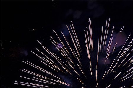 fireworks - Fireworks exploding in night sky Stock Photo - Premium Royalty-Free, Code: 614-06719754