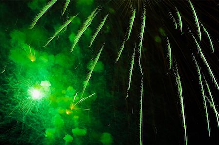 fireworks - Fireworks exploding in night sky Stock Photo - Premium Royalty-Free, Code: 614-06719759