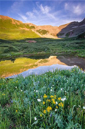 Still pond in green valley Stock Photo - Premium Royalty-Free, Code: 614-06720088