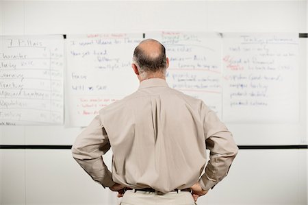 présenté - Mature man confused by presentation Photographie de stock - Premium Libres de Droits, Code: 614-06814066