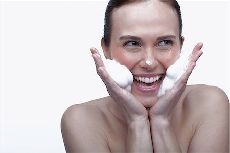 Young woman cleansing face Foto de stock - Sin royalties Premium, Código: 614-06814230