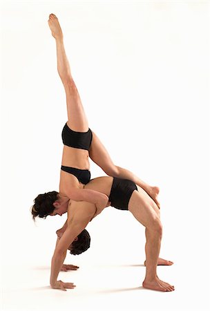 symbiotique - Mid adult couple performing modern dance Photographie de stock - Premium Libres de Droits, Code: 614-06814298