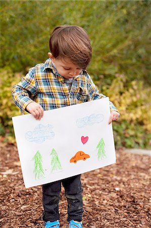 papel (material) - Male toddler holding crayon drawing Foto de stock - Sin royalties Premium, Código: 614-06814363