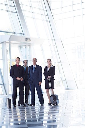 Portrait of businesspeople in airport Stock Photo - Premium Royalty-Free, Code: 614-06813214