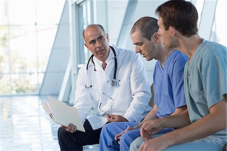 Three male doctors Stock Photo - Premium Royalty-Free, Code: 614-06813240