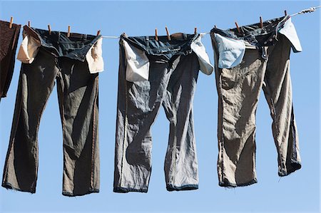 Trousers on clothes line Photographie de stock - Premium Libres de Droits, Code: 614-06813277