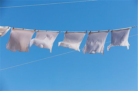 T shirts on clothes line Stock Photo - Premium Royalty-Free, Code: 614-06813278
