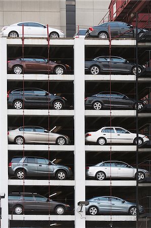 parcheggio - Cars parked in automatic parking lot Fotografie stock - Premium Royalty-Free, Codice: 614-06813291